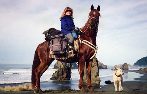 Tracy and her horse Dawn, and dog Myles on the Oregon coast
