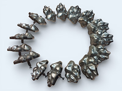 A large set of aluminum Pet-Paw cabinet knobs