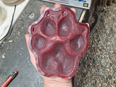 Wax imprint pattern of a giant dog paw